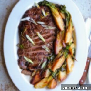 Succulent Grilled Asian Flank Steak 9 Asian marinated grilled flank steak on white platter