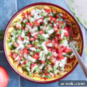 square image of pico de gallo in colorful bowl